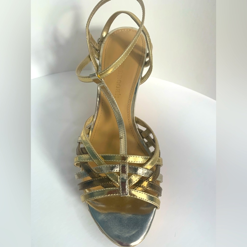 Audrey Brooke metallic gold silver and bronze wedge Slightly rounded toe